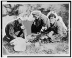 [Three medics of the Irish Free State troops treating a prisoner during fighting between the Irish Free State troops and the Irish Republican Army]