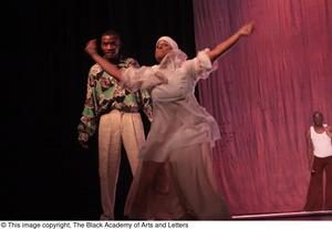 Dancer in white dress with groom dancer