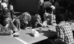 Friends feeding friends, Los Angeles, 1986