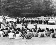 Police and African American protesters face off outside Holy Family Hospital, Fairburn, Georgia, April 28, 1972.