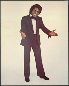 Poster featuring James Brown in a black suit and bowtie