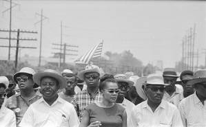 Ralph Abernathy, Coretta Scott King, Martin Luther King, Jr., Floyd McKissick, and other marchers in Jackson, Mississippi, near the end of the March Against Fear begun by James Meredith.