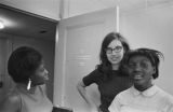 Barbara Howard Flowers, Gail Falk, and Rubye Howard at the Southern Courier office in the Frank Leu Building in Montgomery, Alabama.