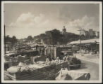 Looking up Assembly Street, truck with cantaloupe in foreground, State House beyond, 1946