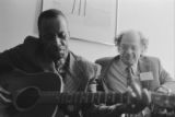 Thumbnail for James ""Son"" Thomas: Houston, Tex. Modern Language Association Meeting. James ""Son"" Thomas and Allen Ginsburg. Thomas playing guitar (JTP 50-80-12/31 #1689)