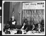 Charlotta Bass listens to a speech during a birthday celebration for the Independent Progressive Party, circa 1949, Los Angeles