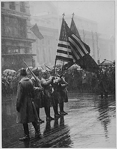 "Buffaloes." 367th Infantry, [African American] troops return colors to Union League Club. Men draw...