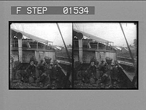 Negro women carrying coal at a penny a basket from lighter to steamer, Cristobal: 11507 stereo photonegative