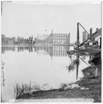 [Richmond, Va. Ruined buildings on banks of the Canal Basin]