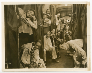 Photographic print of Cab Calloway and his band in a sleeper car