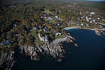 An October 2017 aerial view of homes high above the Atlantic Ocean on the rocky coast of Maine, near Bald Head Village