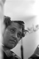 Woman having her hair put up in curlers at a beauty salon in Montgomery, Alabama.