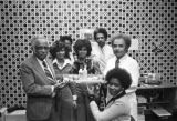 Employees with a tray of Velberta haircare products at the Hair Research Laboratories in Selma, Alabama.