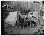 [Petersburg, Va. Officers of the 114th Pennsylvania Infantry playing cards in front of tents]