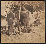 [Captain Beriah S. Brown of Co. H, 2nd Rhode Island Infantry Regiment, Captain John P. Shaw of 1st Rhode Island Infantry Regiment and Co. F, 2nd Rhode Island Infantry Regiment, and Lieutenant T. Fry with three African American boys at Camp Brightwood, Washington, D.C.]