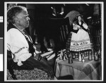 Charlotta Bass, in Russian folk costume, during a party at her home, after circa September 1950, Los Angeles