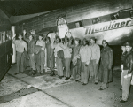 A group photograph of African American veterans with their veteran friends getting into a bus after flight, Washington, D.C