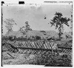 [Atlanta, Ga. Chevaux-de-frise on Marietta Street; photographic wagons and darkroom beyond]