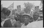 [Demonstrators holding signs during the March on Washington, 1963]