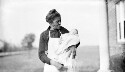 Personal. Unidentified woman holding Ruth Davis