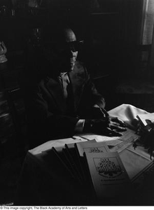 Photograph of Rev. James Garfield Owens and his book #2