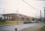 Pearl High School: view from street with parked cars