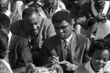 Muhammad Ali signing autographs during homecoming activities for Alabama State College on Thanksgiving Day in Montgomery, Alabama.