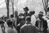 Young man speaking into a bullhorn during a student demonstration at Miles College in Birmingham, Alabama, after the death of Martin Luther King Jr.