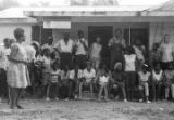 Edward Rudolph and others, standing on the porch of the Autauga County Improvement Association office in Prattville, Alabama, on the day of a civil rights march.