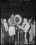 Sugar Ray Robinson and Carl (Bobo) Olson weigh in