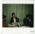 Photograph of a Dorothy F. Steele eating dinner