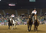 Members of the Westernaires, a Jefferson County, Colorado, organization that teaches and employs Roman-style riding (a rider standing atop two galloping horses) perform at the Martin Luther King, Jr., African-American Heritage Rodeo, one of the National Western Stock Show events in Denver, Colorado