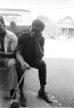 James "Bubba" Bradley seated on the tailgate of a pickup truck parked in front of Pugh's Superette on Foster Street in Newtown, a neighborhood in Montgomery, Alabama.