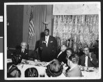 Charlotta Bass and other guests attend a birthday celebration for the Independent Progressive Party of California, circa 1949, Los Angeles