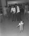 Young men breakdancing during the Chamber of Commerce trade show at Garrett Coliseum in Montgomery, Alabama.