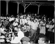 Davison-Paxon Company sponsored segregated staff outings, such as this nighttime picnic for African Americans. An Atlanta, Georgia, park, August 18, 1954