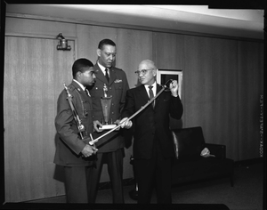 Nat[iona]l Drill team award presented to [Howard University] Pres[ident] Nabrit, Feb[ruary] 1964 [cellulose acetate photonegative]