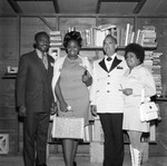 Four People In Front of Bookshelf, Los Angeles