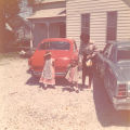 Woman and Children in Driveway