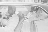 Walter Bradley and Josephine Bradford leaving Holt Street Baptist Church in Montgomery, Alabama, after their wedding.