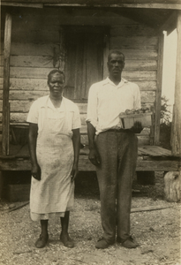 Parris and Rosa Capers [Gullah informants] in front of their house on St. Helena Island, S.C