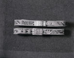 Two carved Hopi belts with overlaid silver buckles [2]