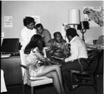 A. Philip Randolph Institute members talking in an office, Los Angeles, 1972