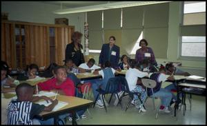 Women with Gates Elementary Students