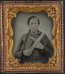 [Unidentified soldier in Confederate uniform with knife and revolver]