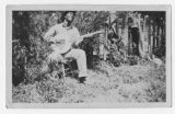 Man Playing Banjo on set of "Hallelujah!"