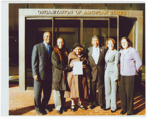 Digital image of Charles Ogletree Jr., Dr. Olivia Hooker, Otis Clark, and others