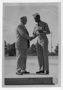 Photograph of Commissioner Alcorn welcoming home Sergeant Albert Dixon, Manchester, Georgia, 1953