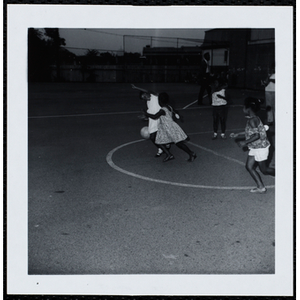 Participants of the Little Sister Contest playing a soccer game