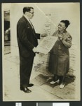 Charlotta Bass receives proclamation from attorney Walter L. Gordon, Jr., circa September 1949, Los Angeles